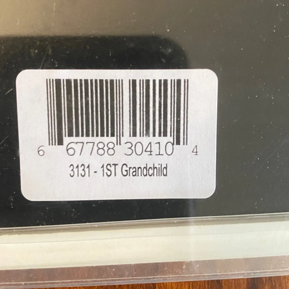 Double picture frame. 5 1/2 x 3 1/2 each side. First Grandchild. NWT